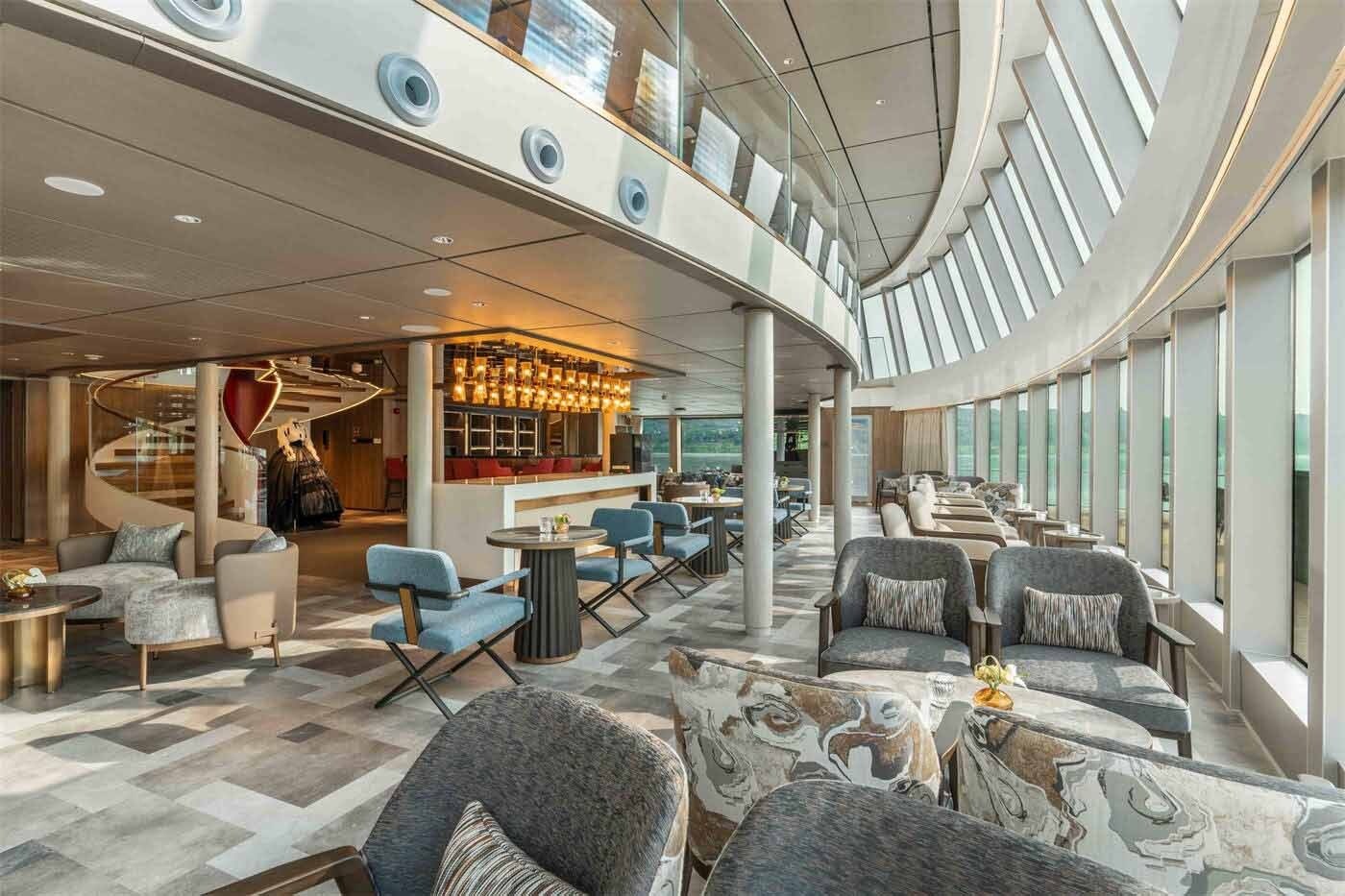 The bright, contemporary lounge aboard a Century Cruising ship
