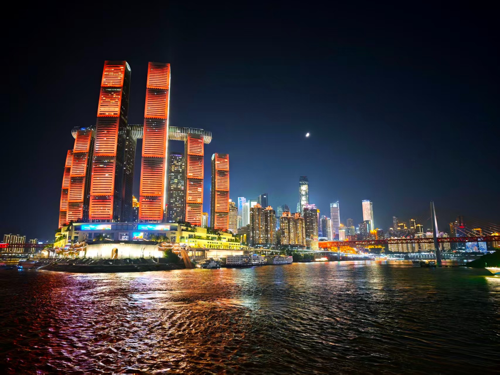 Chongqing's illuminated skyline beside the Yangtze River