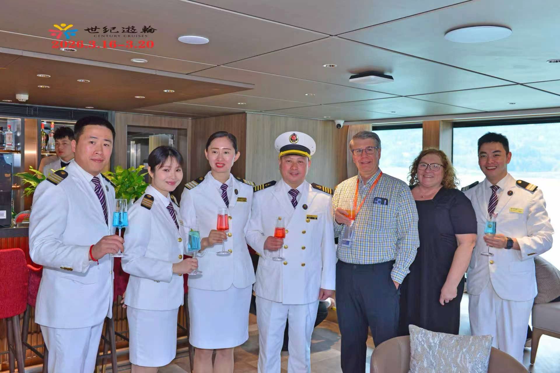 Steve with ship officers and travel companions aboard a river cruise